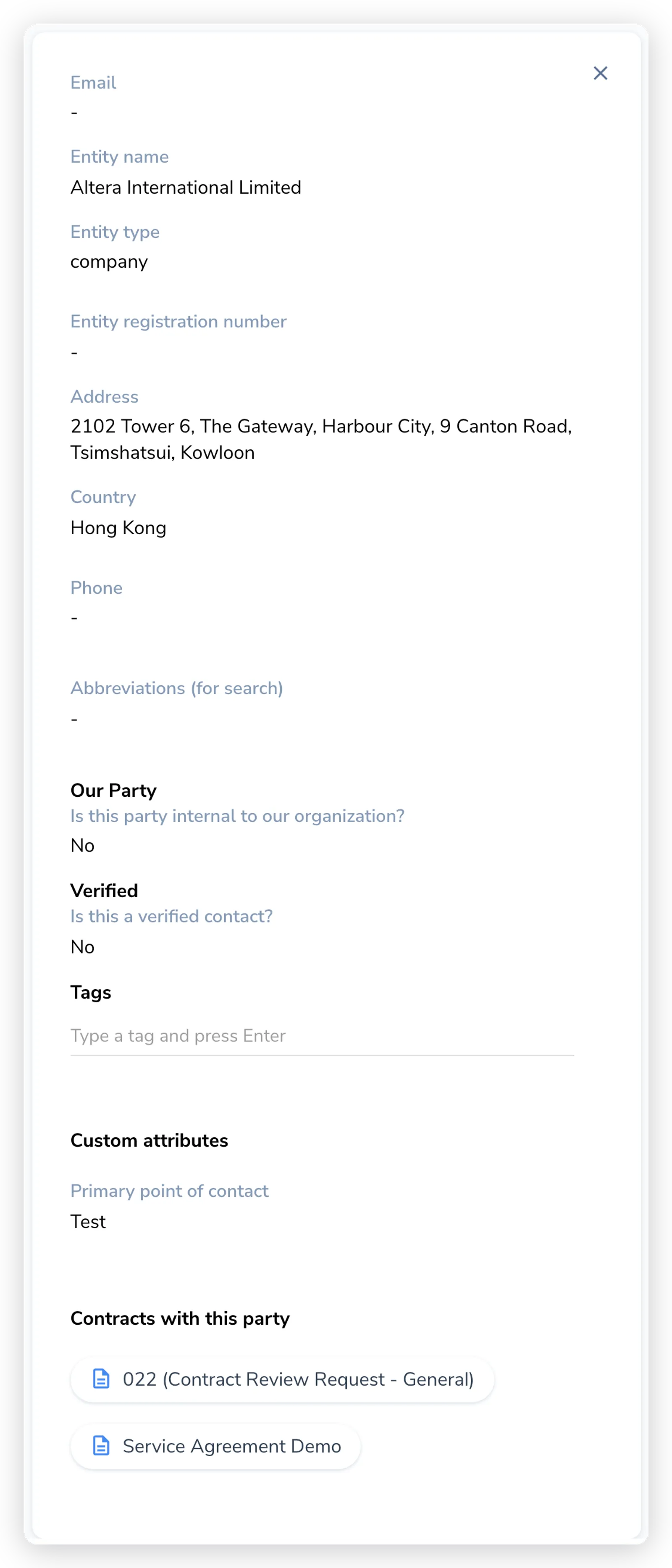 The side panel for a company contact, showing entity fields, the Our Party and Verified toggles, Tags, Custom attributes, and the Contracts with this party list